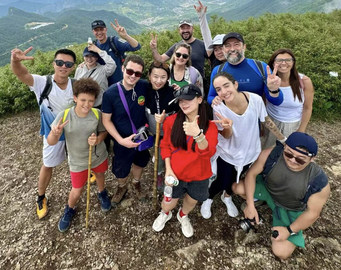 Friends joining an outdoor travel experience in China
